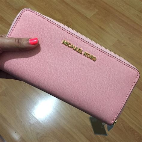 Michael Kors Pink Wallets .